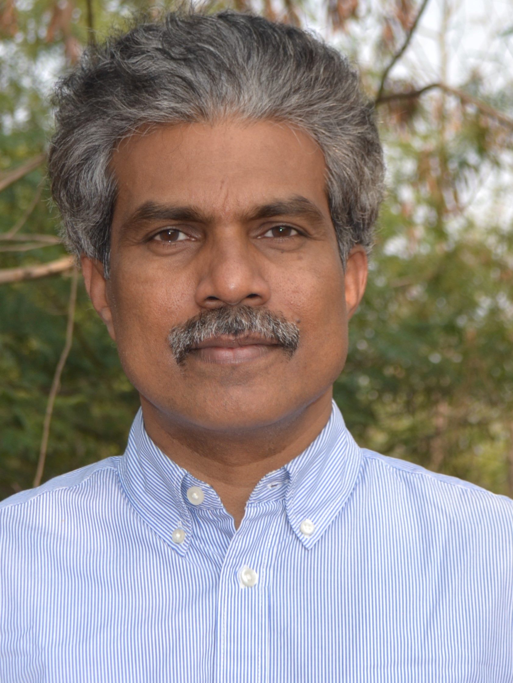 Dr. T. G. Suresh